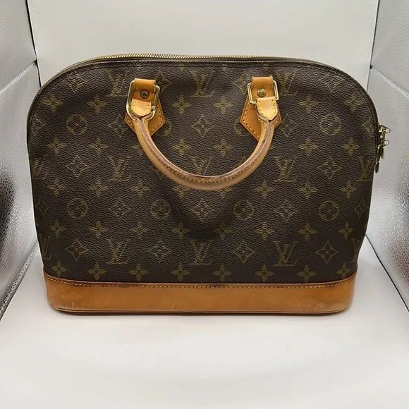 Louis Vuitton Alma PM Handbag - Picture 8 of 11
